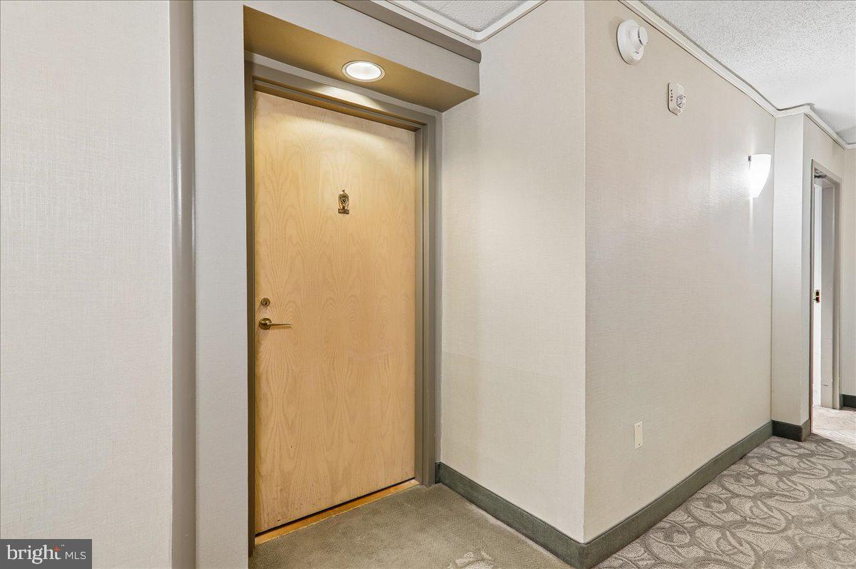 2111 Wisconsin Avenue Northwest, Unit 118 Washington, DC 20007 - Photo 7 of 61 a view of a bathroom with a glass door