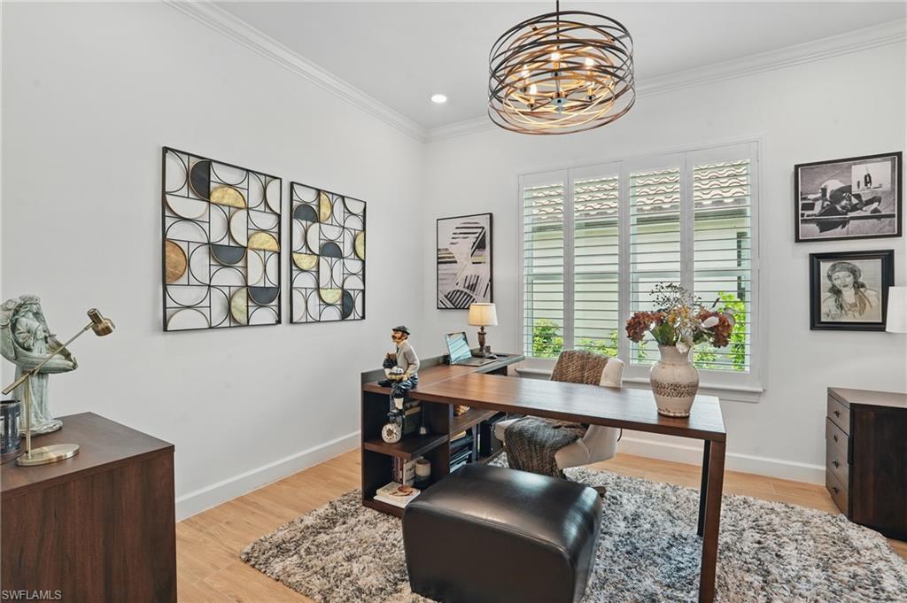 17467 Caravita Lane Fort Myers, FL 33913 - Photo 20 of 50 a living room with furniture and a table