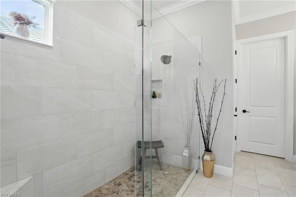 17467 Caravita Lane Fort Myers, FL 33913 - Photo 23 of 50 a bathroom with a shower