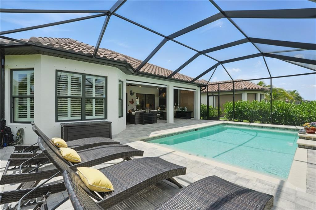 17467 Caravita Lane Fort Myers, FL 33913 - Photo 36 of 50 a view of a backyard with sitting area