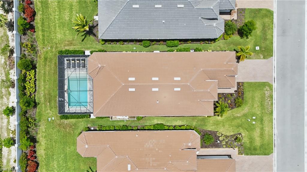 17467 Caravita Lane Fort Myers, FL 33913 - Photo 37 of 50 an aerial view of a house with a yard and garden