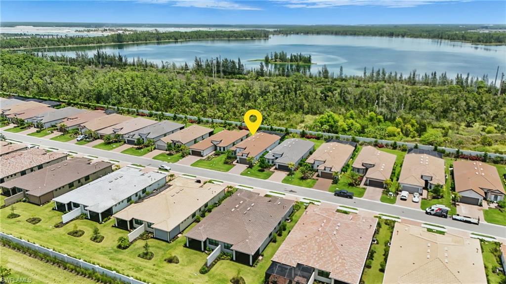 17467 Caravita Lane Fort Myers, FL 33913 - Photo 42 of 50 an aerial view of a city with lake view