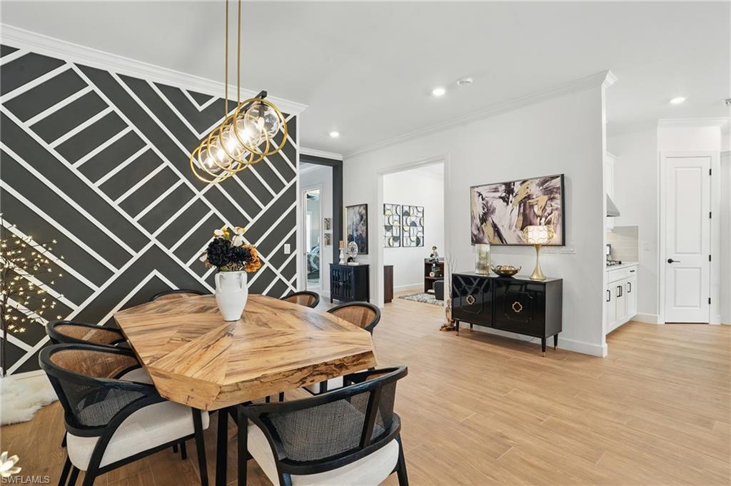 17467 Caravita Lane Fort Myers, FL 33913 - Photo 8 of 50 a living room with furniture and a flat screen tv