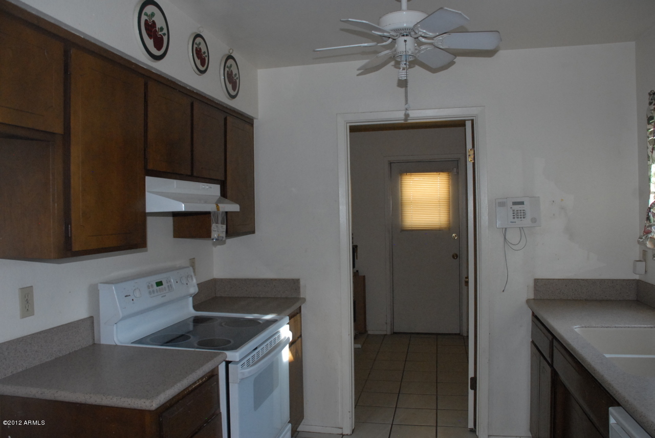 3008 West Redfield Road Phoenix, AZ 85053 - Photo 8 of 29 Kitchen looking into dining area