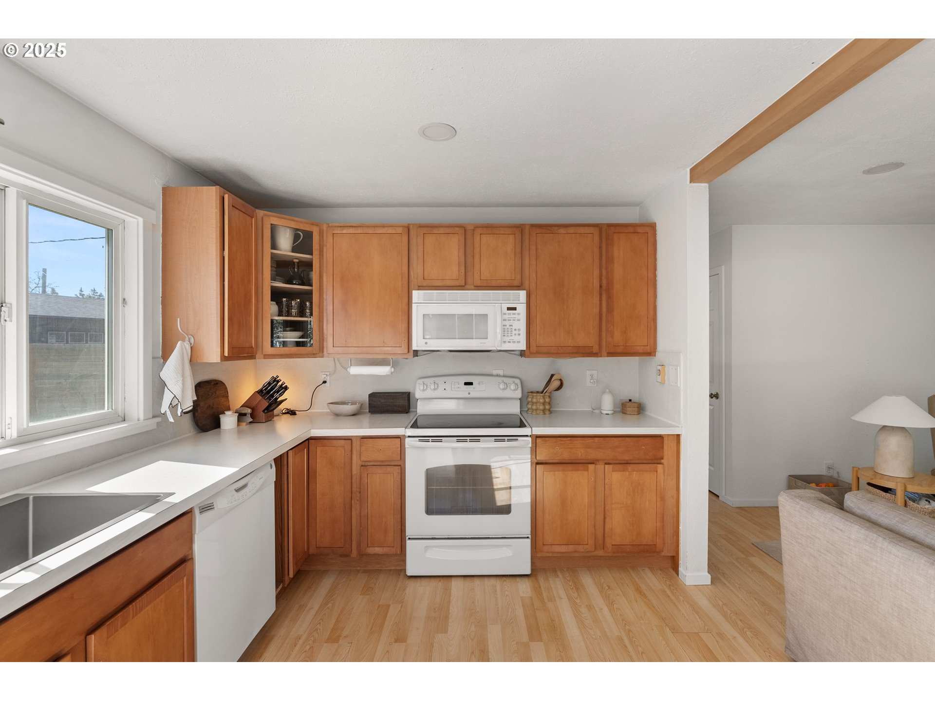 118 Eadon Road Toledo, WA 98591 - Photo 11 of 42 a kitchen with a sink stove and cabinets