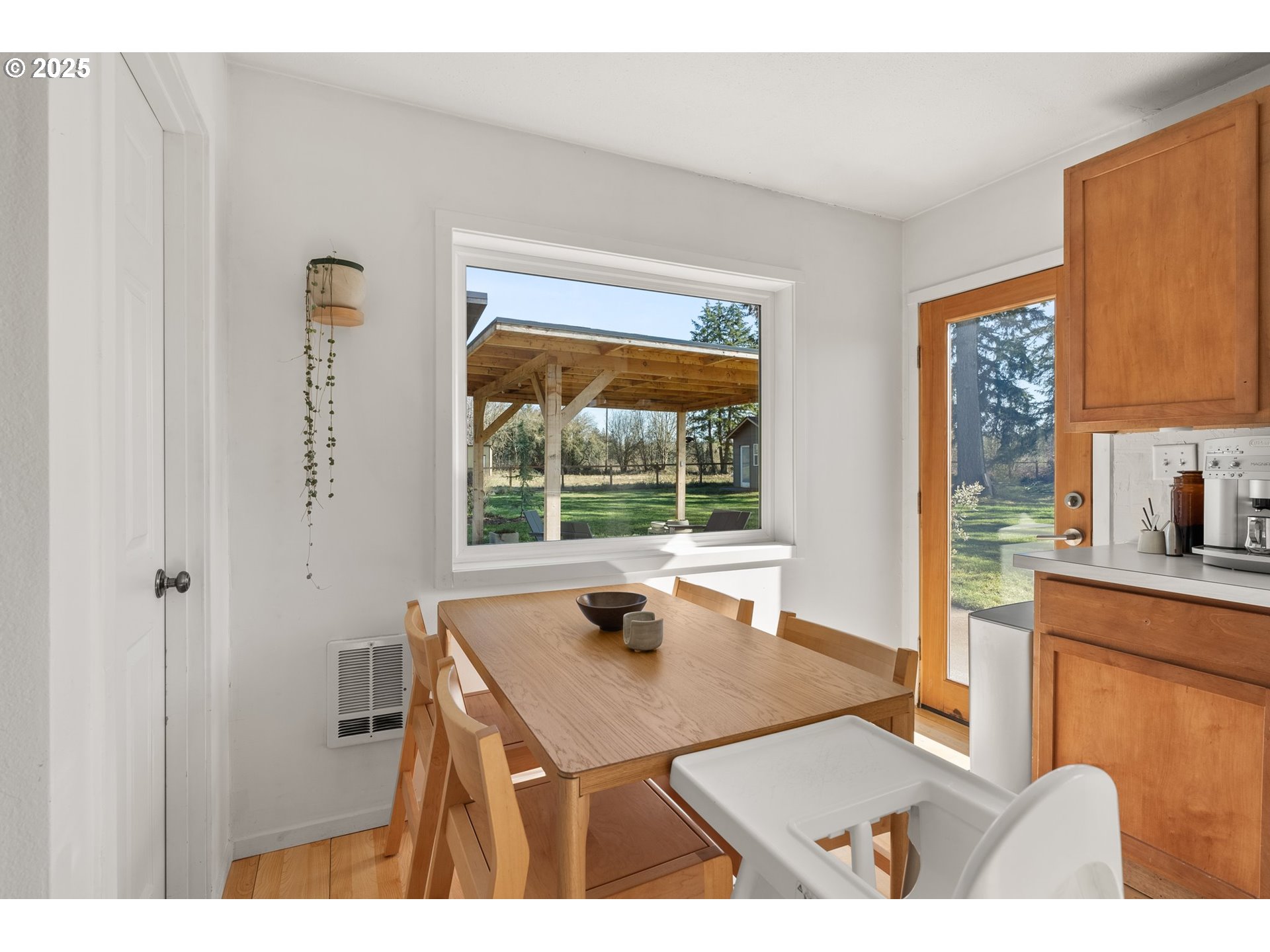 118 Eadon Road Toledo, WA 98591 - Photo 14 of 42 a kitchen with a sink a window and cabinets
