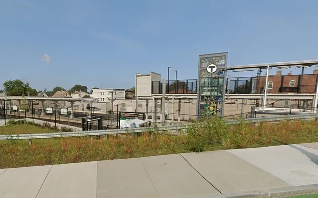 a view of a swimming pool with an outdoor seating