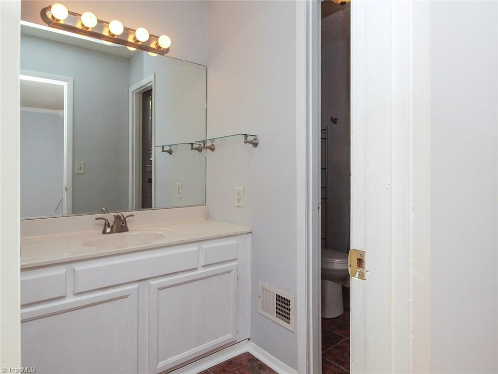 2218 A Shadow Valley Road, Unit A High Point, NC 27265 - Photo 14 of 23 Master bathroom with shower and toilet separate from sink