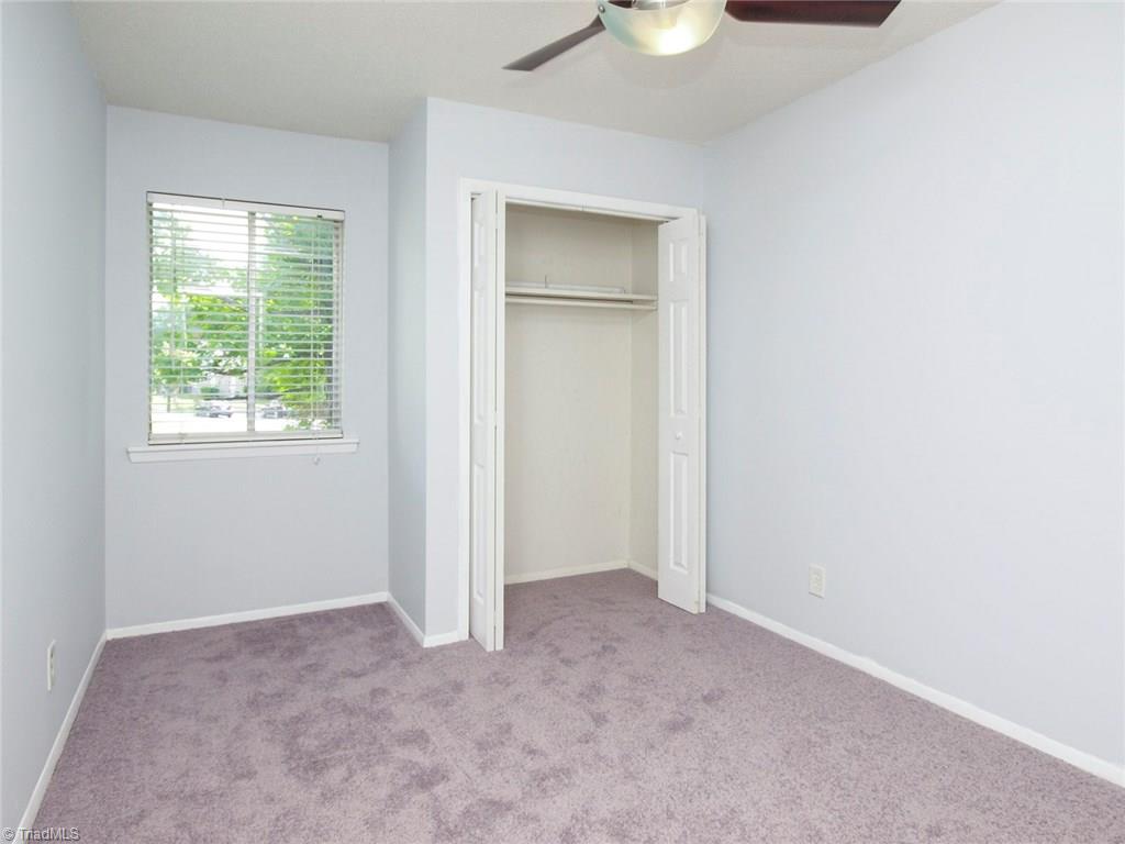2218 A Shadow Valley Road, Unit A High Point, NC 27265 - Photo 16 of 23 Bedroom 2 with fresh paint, new carpet and ceiling fan