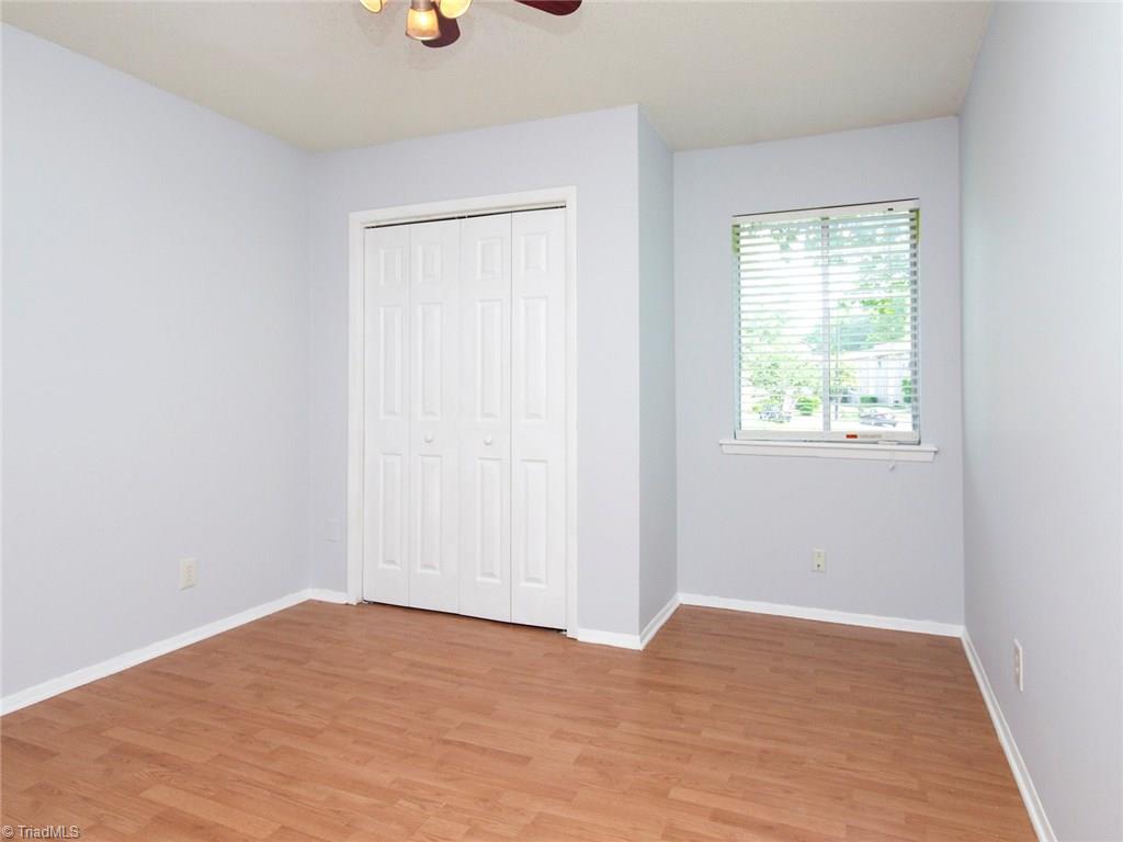 2218 A Shadow Valley Road, Unit A High Point, NC 27265 - Photo 18 of 23 Bedroom 3 with fresh paint, newer floors and ceiling fan