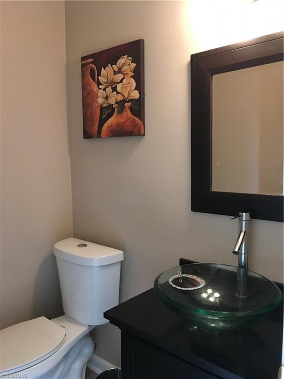 2218 A Shadow Valley Road, Unit A High Point, NC 27265 - Photo 5 of 23 Half bath downstairs with vessel sink