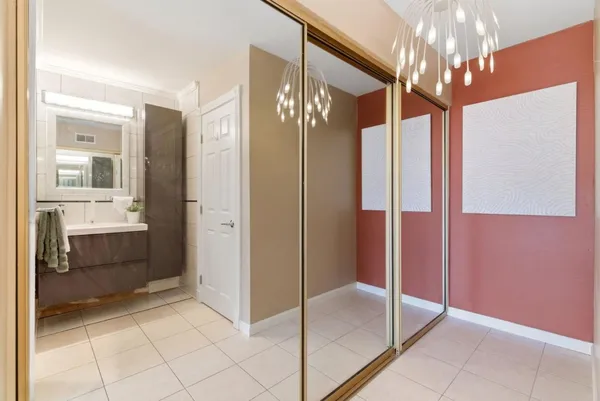 a bathroom with a shower and a sink