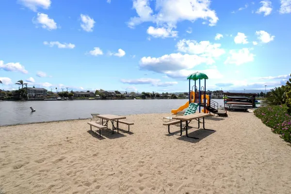 a view of a lake with a sitting space