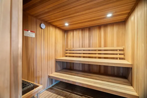 a front view of a residential apartment building with a yard