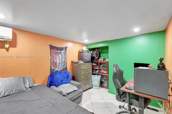 a bedroom with furniture and a bed