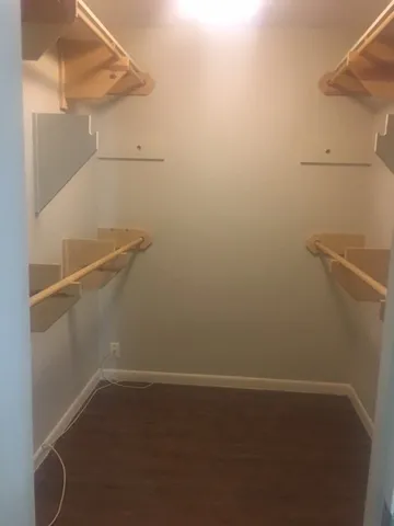 a view of a room with racks on the wall