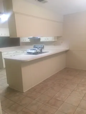 a view of kitchen cabinets