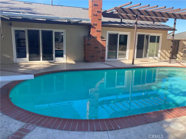 front view of a house with a garden