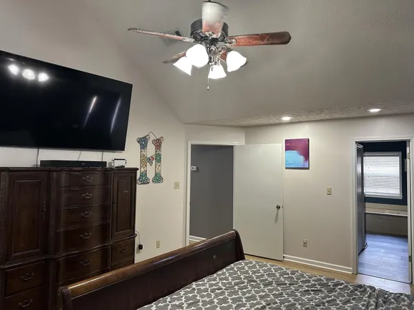 a view of a livingroom with wooden floor