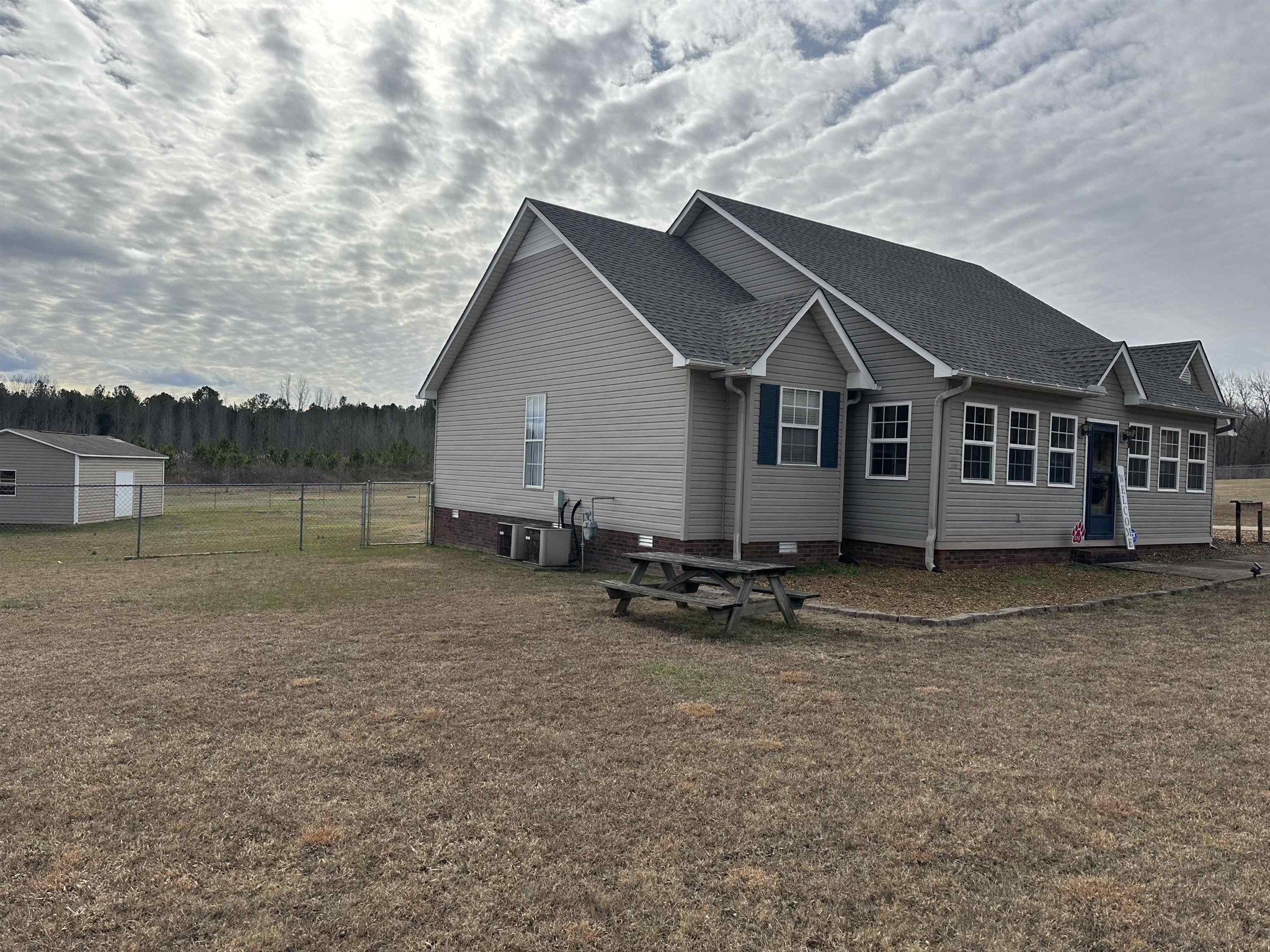 58 Bowman Loop Beech Bluff, TN 38313 - Photo 37 of 40 a view of a house with a yard