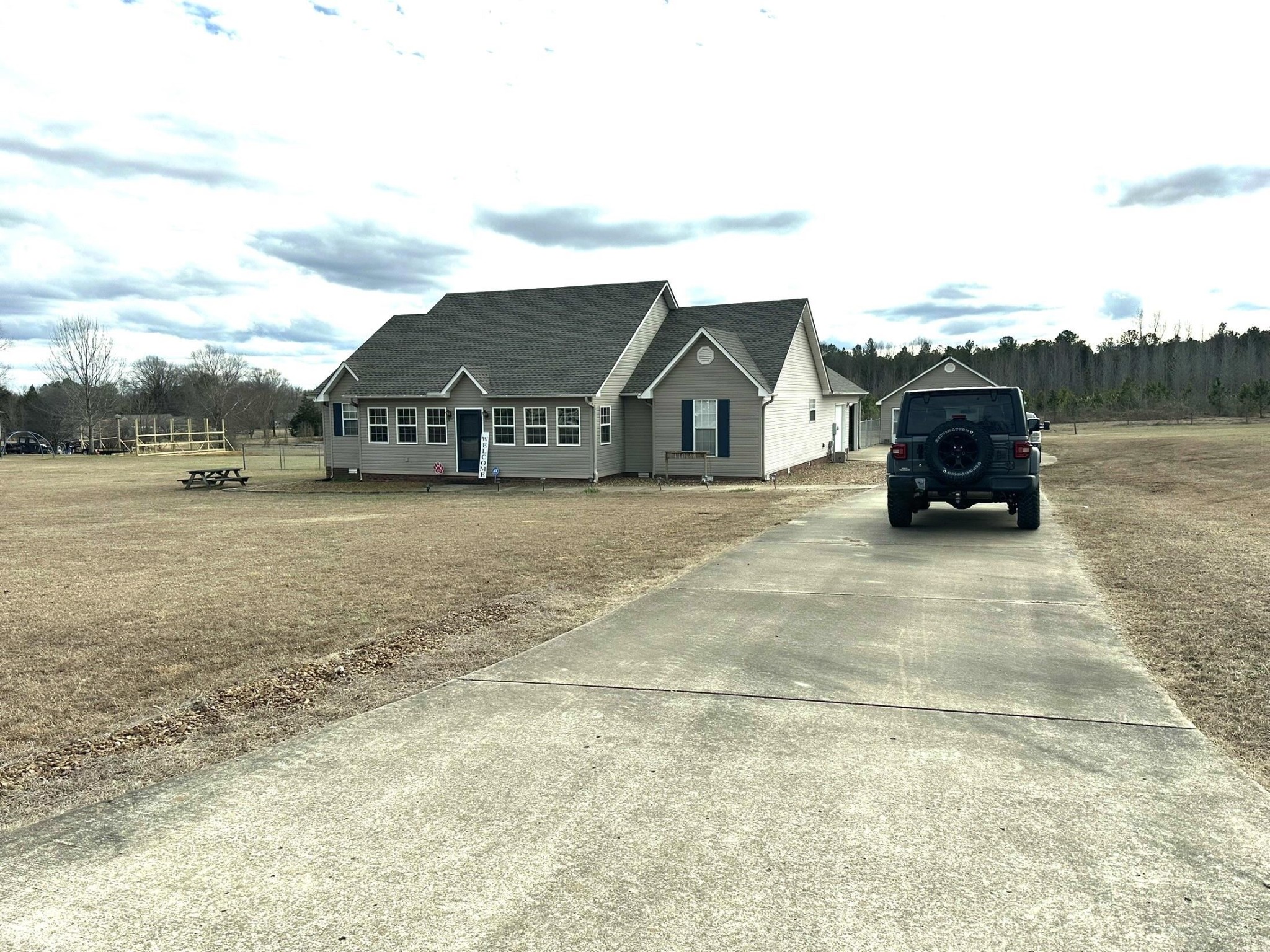 58 Bowman Loop Beech Bluff, TN 38313 - Photo 38 of 40 view of a house with a outdoor space