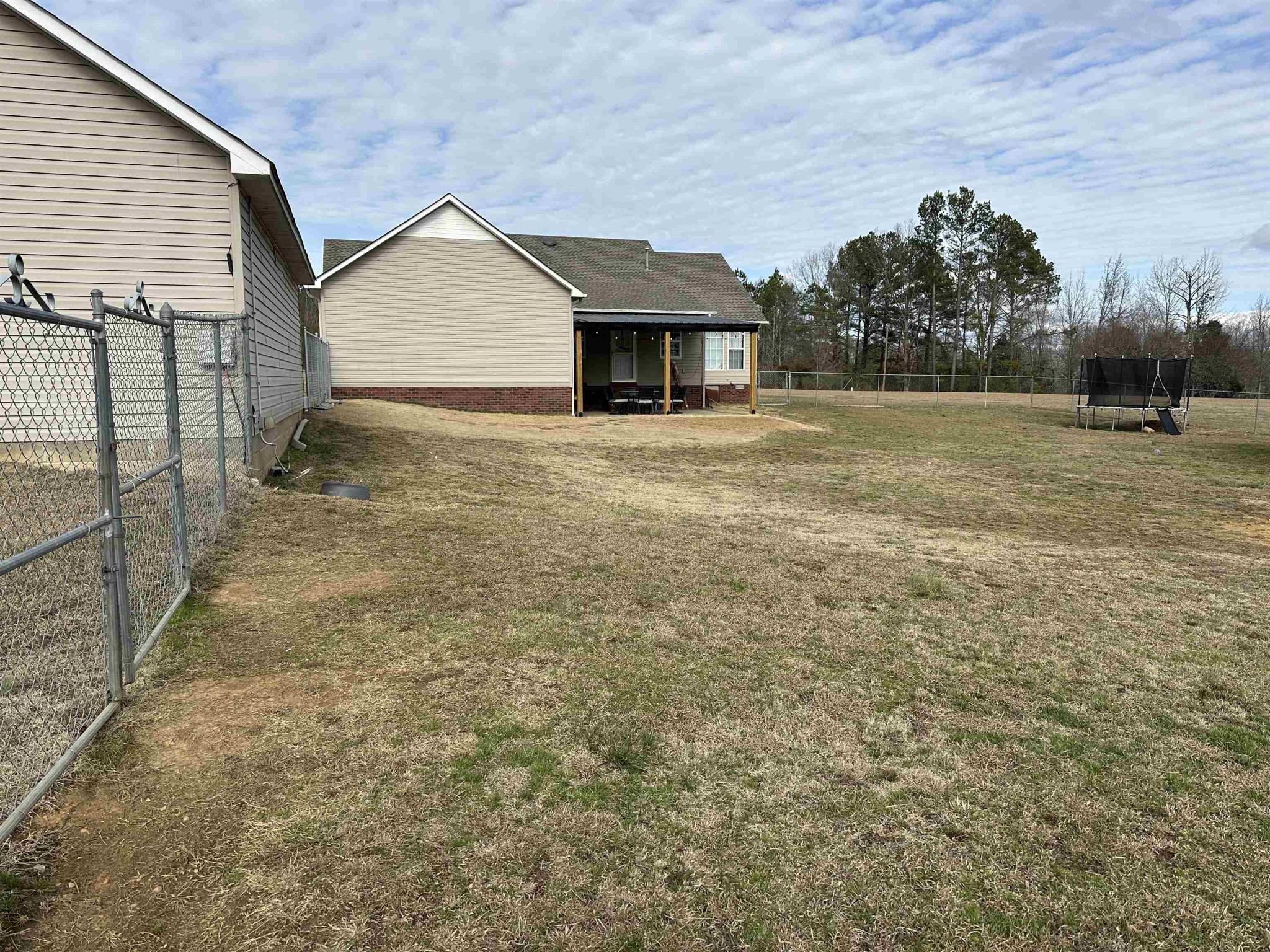 58 Bowman Loop Beech Bluff, TN 38313 - Photo 40 of 40 a view of a house with a yard