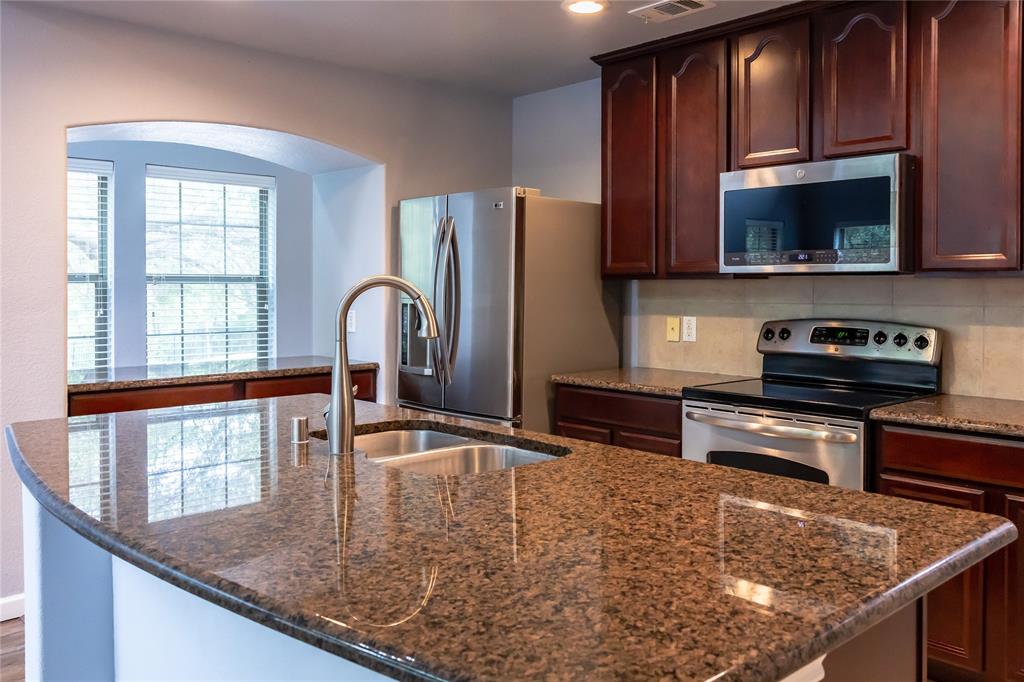 1124 Sophia Street Allen, TX 75013 - Photo 7 of 27 Oversized center island with abundant seating,