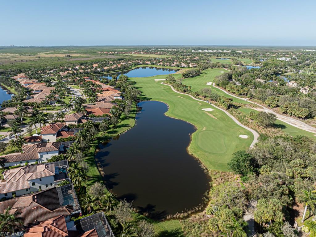 3273 Runaway Lane Naples, FL 34114 - Photo 4 of 45 an aerial view of ocean residential house with outdoor space and trees all around