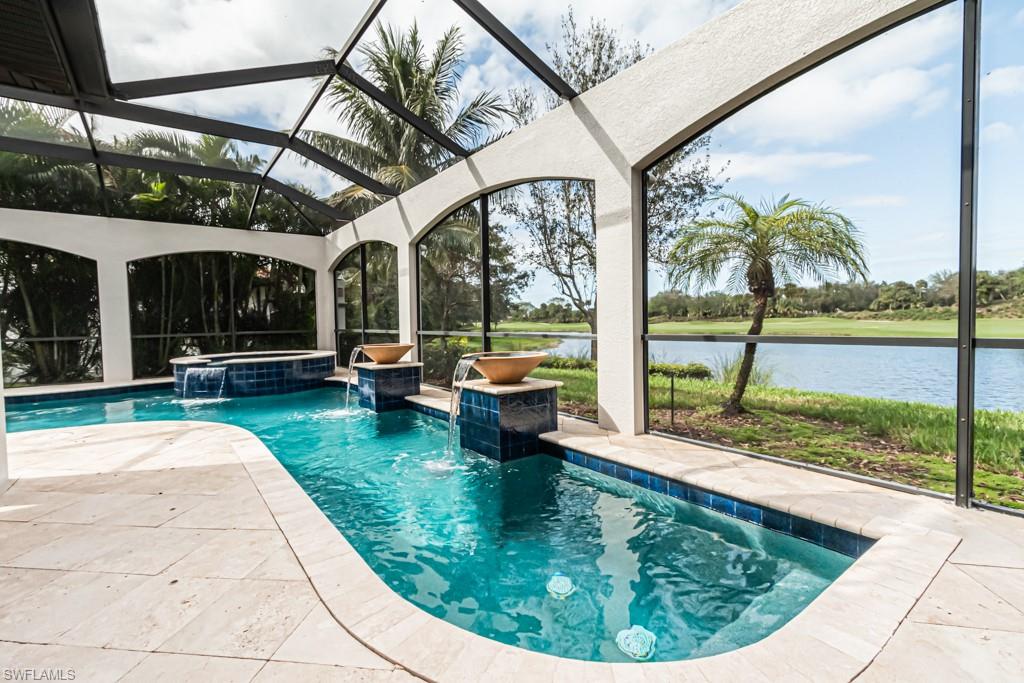 3273 Runaway Lane Naples, FL 34114 - Photo 43 of 45 a view of a swimming pool with a sitting area
