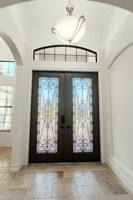 3273 Runaway Lane Naples, FL 34114 - Photo 5 of 45 a view of front door with entryway