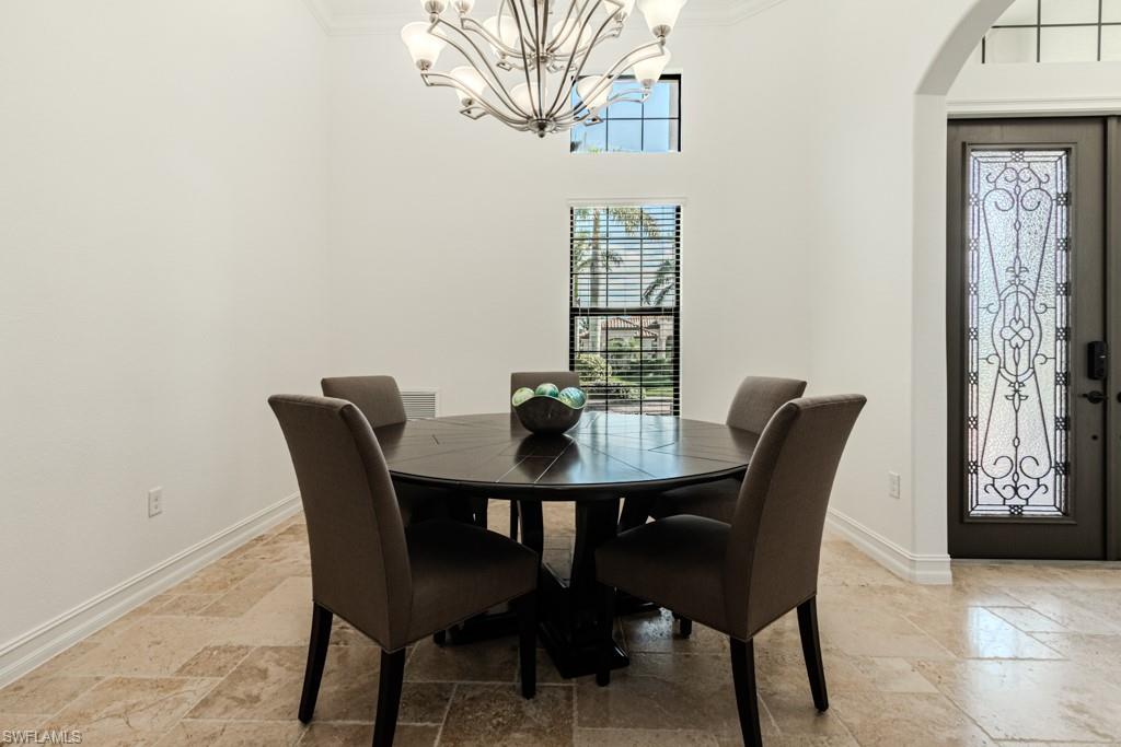 3273 Runaway Lane Naples, FL 34114 - Photo 6 of 45 a view of a dining room with furniture and window