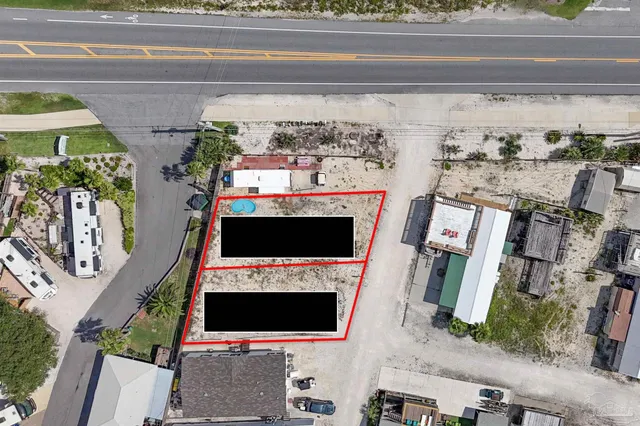 a picture of a living room with a flat screen tv and a fireplace