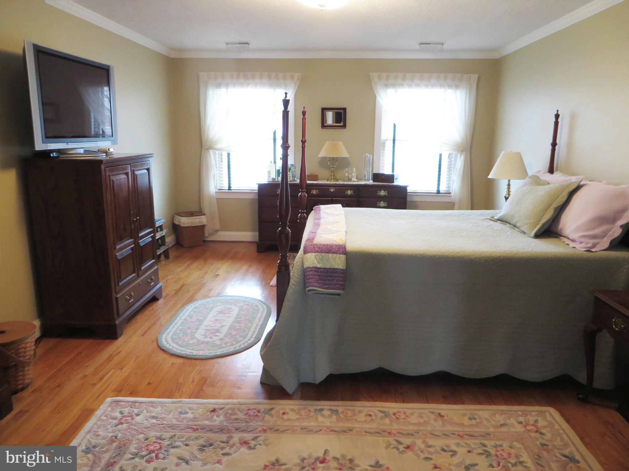 16745 St Jeromes Neck Road Dameron, MD 20628 - Photo 16 of 30 Master bedroom also with hardwood floor