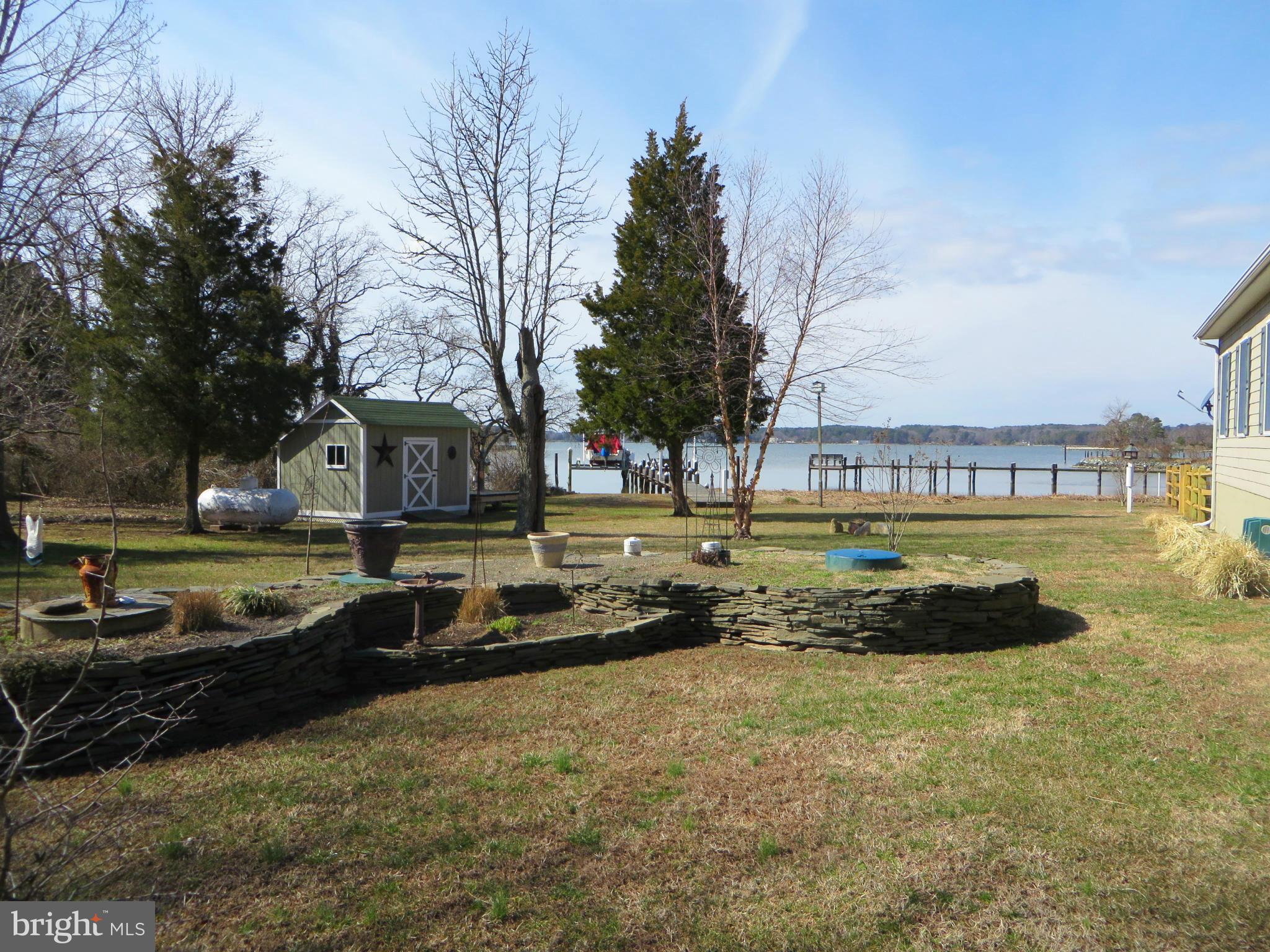 16745 St Jeromes Neck Road Dameron, MD 20628 - Photo 26 of 30 Side yard, landscaping is lovely