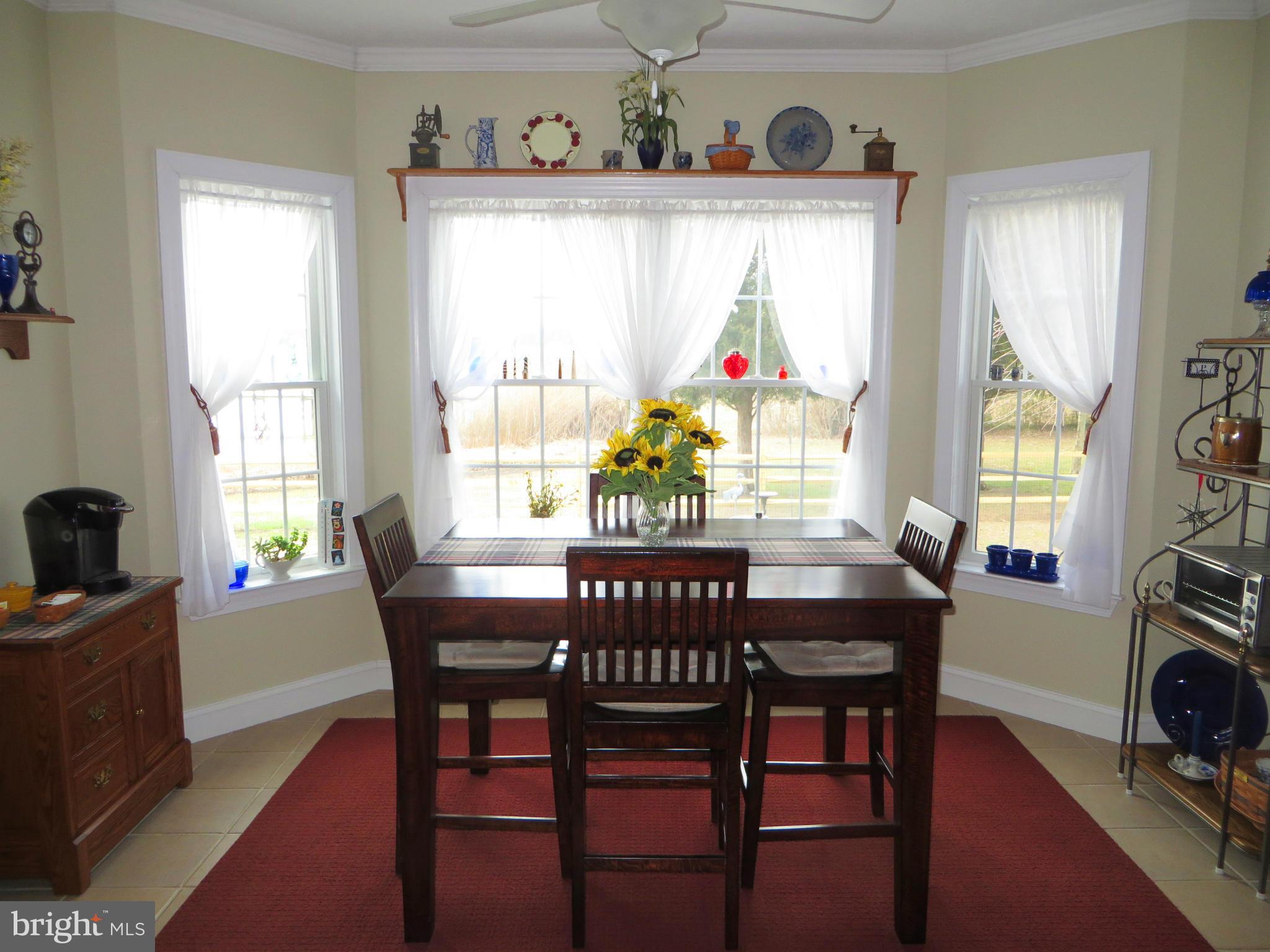 16745 St Jeromes Neck Road Dameron, MD 20628 - Photo 8 of 30 Breakfast area with bumpout, lovely water view