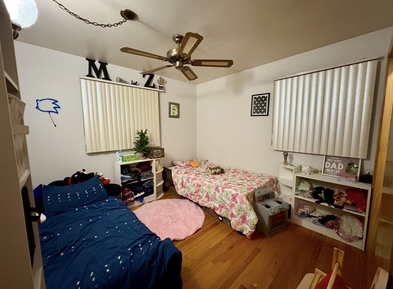 1726 Union Avenue Belvidere, IL 61008 - Photo 11 of 27 a bed room with two bed and a window