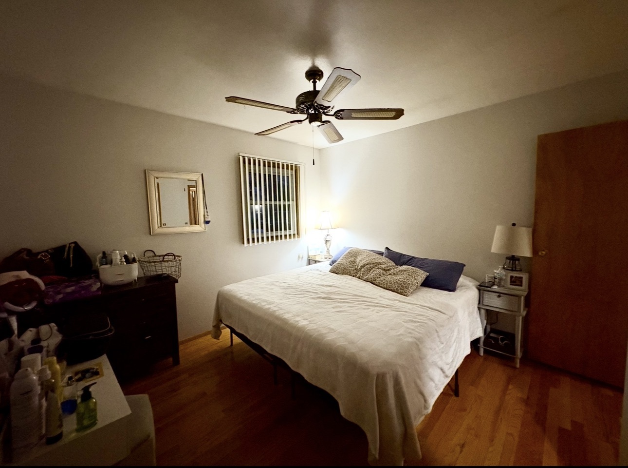 1726 Union Avenue Belvidere, IL 61008 - Photo 12 of 27 a bedroom with a bed and a chandelier