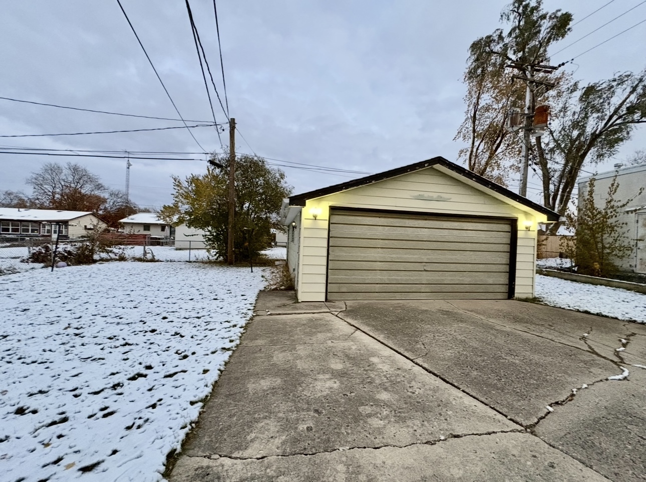1726 Union Avenue Belvidere, IL 61008 - Photo 26 of 27 a view of a house with a yard and garage