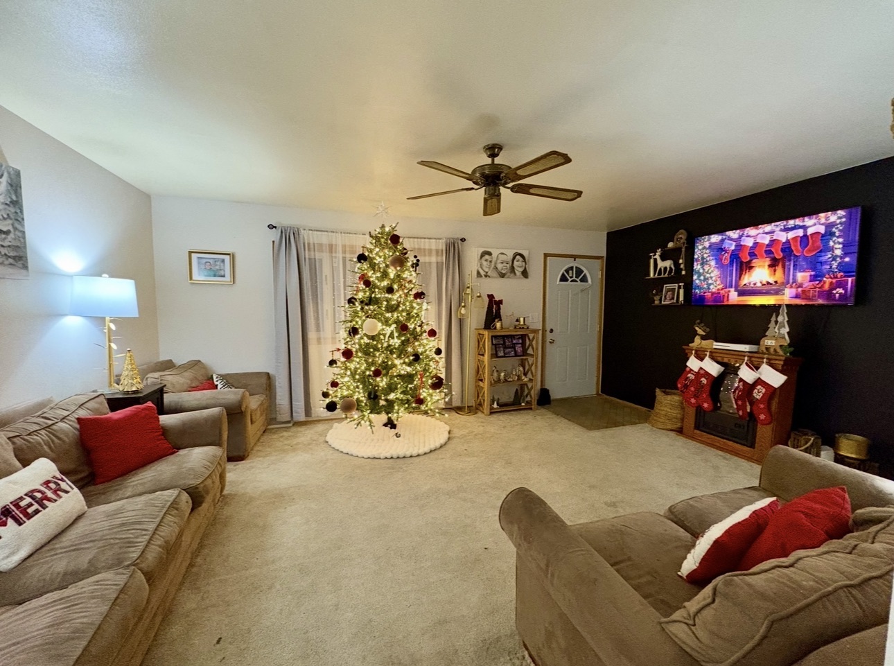 1726 Union Avenue Belvidere, IL 61008 - Photo 3 of 27 a living room with furniture and a flat screen tv
