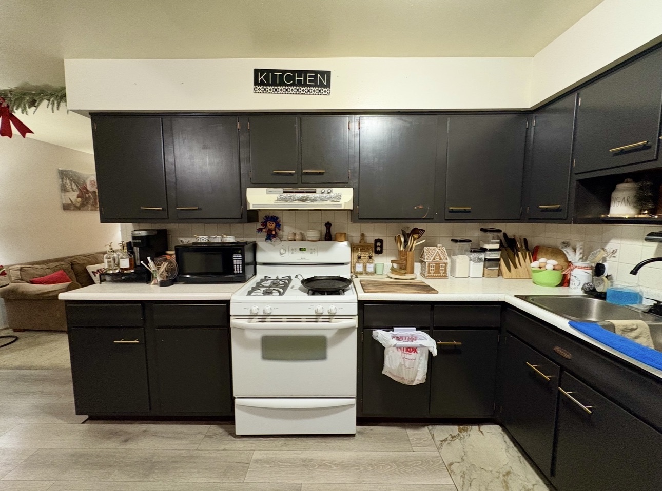 1726 Union Avenue Belvidere, IL 61008 - Photo 9 of 27 a kitchen with a sink a stove and cabinets