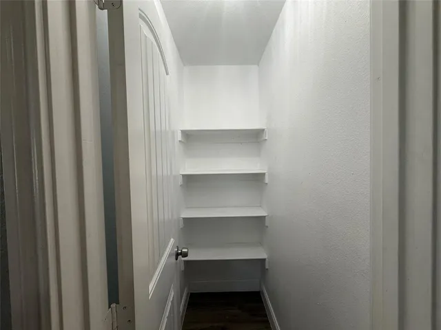 a storage room with washer and dryer