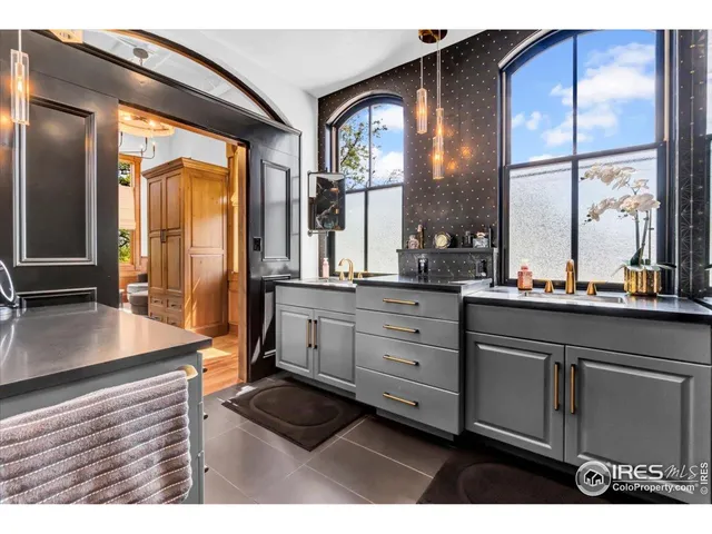 a bathroom with a sink and mirror
