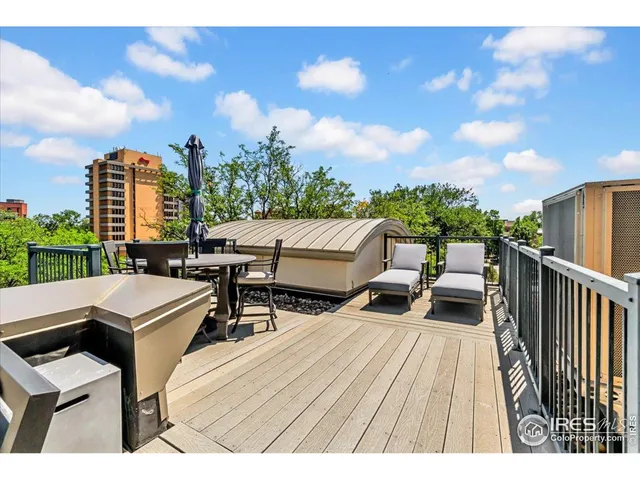 a view of a terrace with sitting area