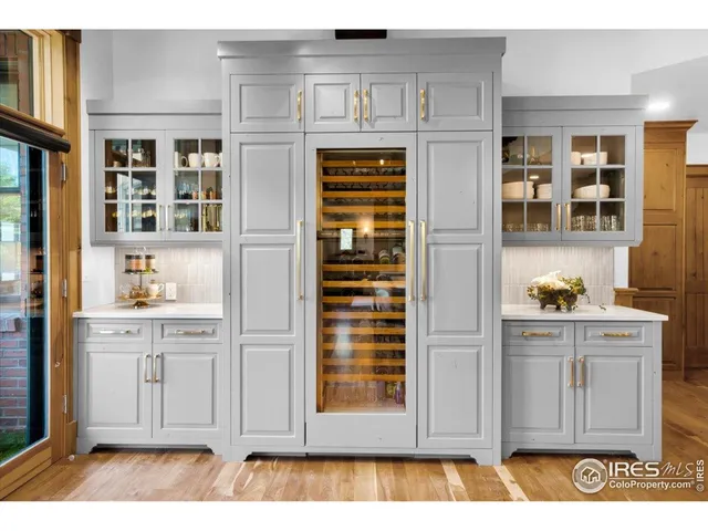 a view of cabinets and window