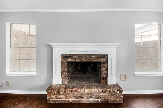 a living room with a fireplace