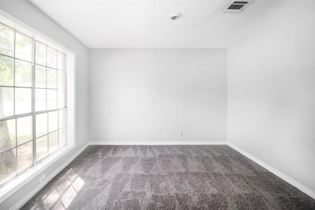 22603 Pine Mist Lane Spring, TX 77373 - Photo 7 of 26 an empty room with a window