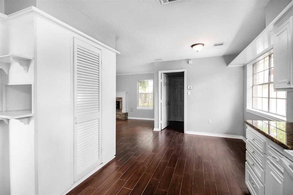22603 Pine Mist Lane Spring, TX 77373 - Photo 10 of 26 a view of a room with wooden floor and a window