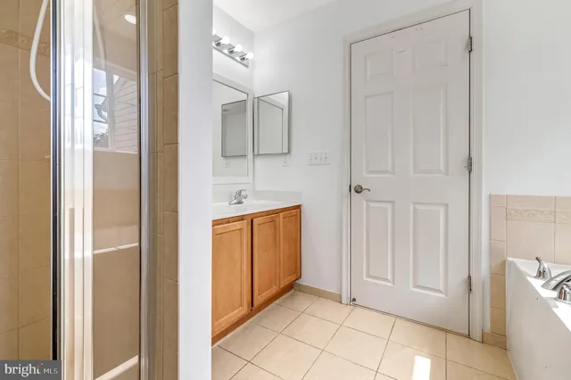 a view of a bathroom from the hallway