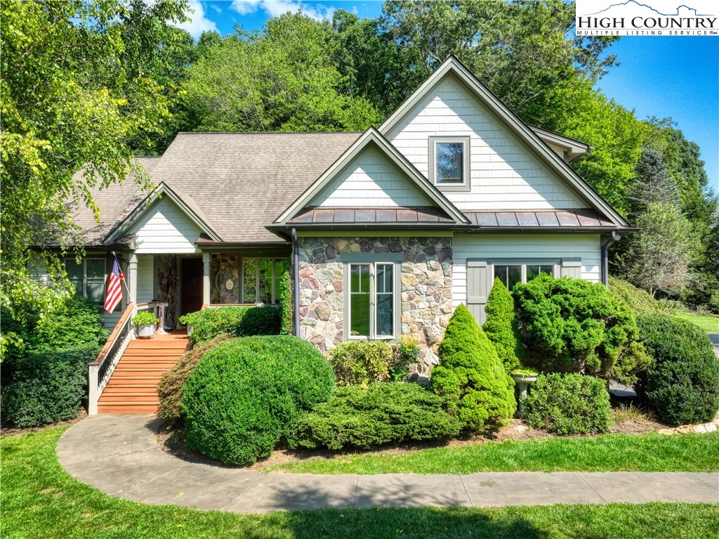 330 Crain Branch Lane Jefferson, NC 28640 - Photo 1 of 45 a front view of a house with garden