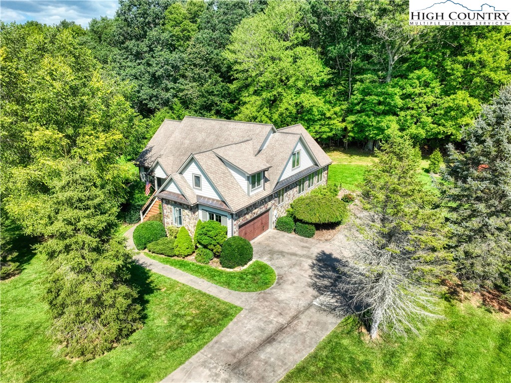 330 Crain Branch Lane Jefferson, NC 28640 - Photo 2 of 45 an aerial view of a house with a garden